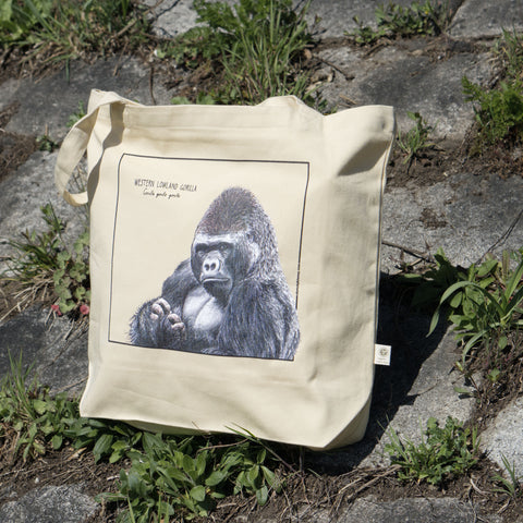 Outside photo of our organic tote bag, featuring a western lowland gorilla. Perfect as gym bag, grocery bag or any place you might need a sturdy, reusable bag!