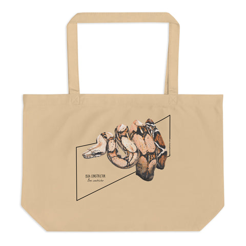 Product mockup of our organic tote bag with a boa constrictor print, here lying flat on a surface.