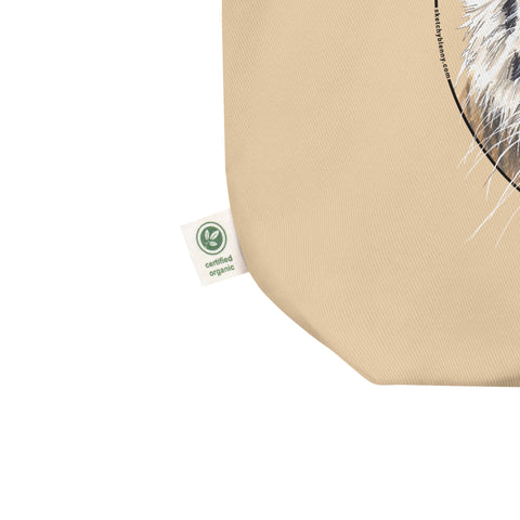 Product mockup of our organic cotton tote bag with a striking siberian tiger print.