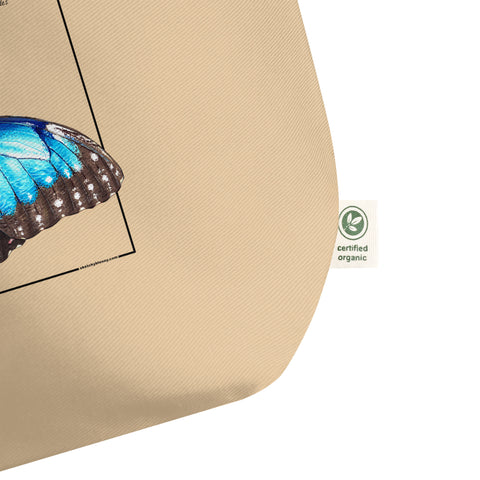 Certified organic label on a mock up of our blue morpho tote bag. Versatile, sturdy, this bag can be used as shopping bag, gym bag or as any everyday bag. Or present!