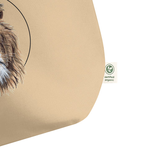 Sketchy Blenny tote bag with a beautiful, life-like print of a hand-drawn lion. 100% organic cotton. Beach bag, shopping bag, travel bag, or just as a present. PETA-approved vegan. close up detail of the certified organic label.