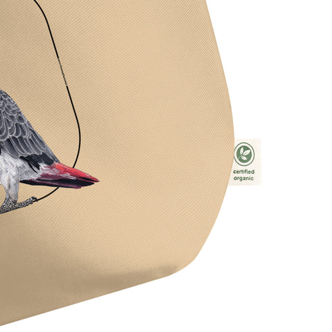 Mock up detail of our tote bag. This sturdy bag comes with a beautiful print of a hand-drawn juvenile grey parrot. 100% organic cotton. Beach bag, shopping bag, travel bag, or just as a present. PETA-approved vegan.