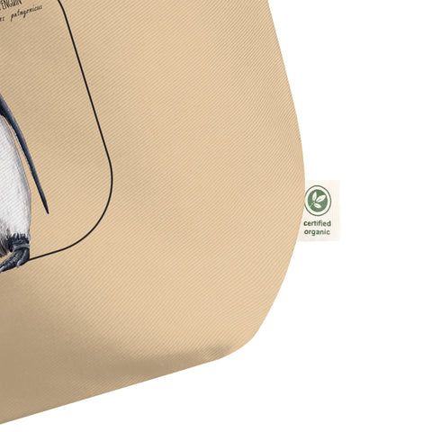 Certified organic label detail on our large and sturdy tote bag. It comes with a beautiful print of a hand-drawn pair of king penguins huddled together. 100% organic cotton. Beach bag, shopping bag, travel bag, or just as a present.