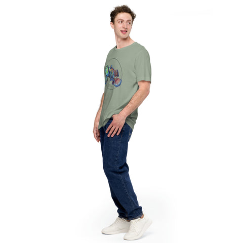 Product mockup showing a male model wearing the t-shirt with a colourful print of two mandarinfish in courtship. Base colour of the shirt is sage.