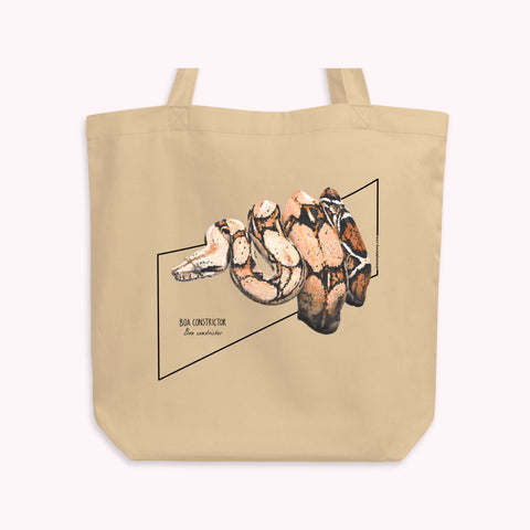 Product mock up of our new organi tote bag, featuring a boa constrictor print.
