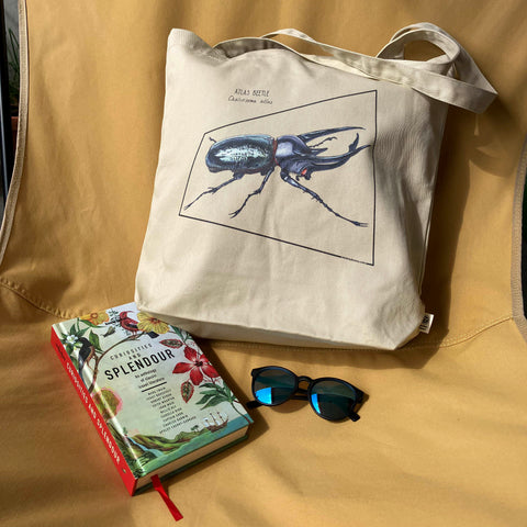 Tote bag with print of an atlas beetle. Beautiful print of hand-drawn animal, 100% organic cotton. Beach bag, shopping bag, travel bag, or just as a present. Here we used it as a beach bag.