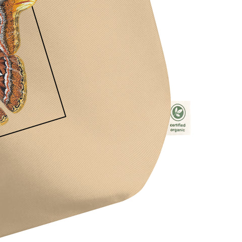 Product mockup of our large organic tote bag, featuring an atlas moth. Here a detail of the organic label.