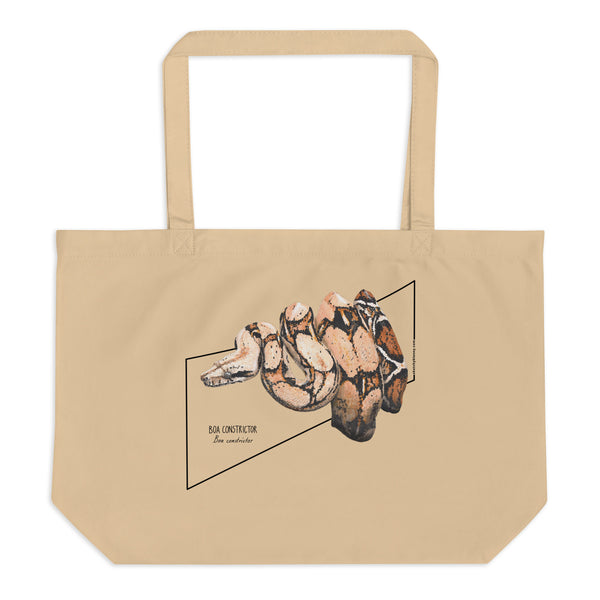 Product mockup of our organic tote bag with a boa constrictor print, here lying flat on a surface.