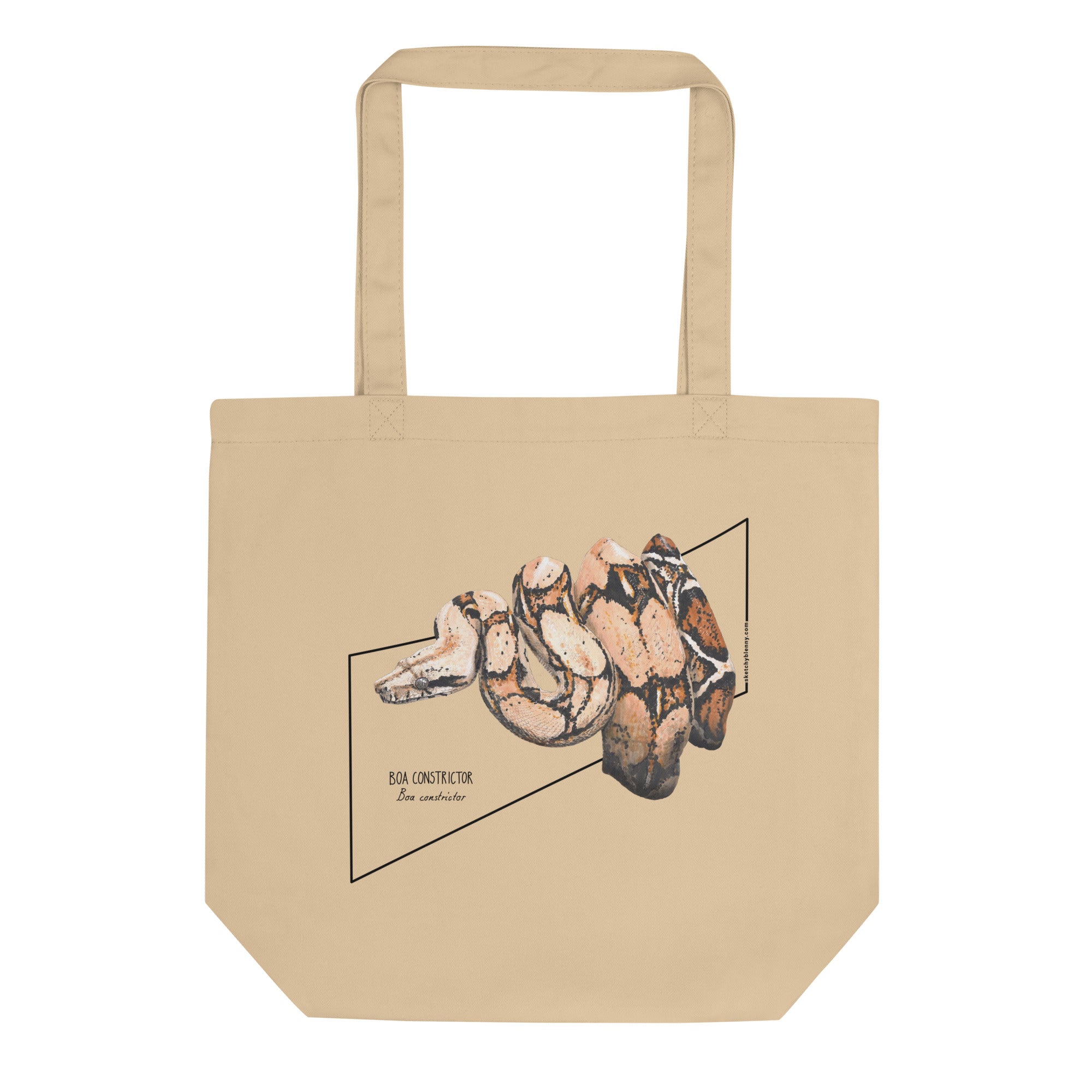 Product mockup of our organic tote bag featuring a boa constrictor, here seen lying flat on a surface.