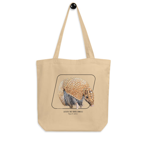 Sketchy Blenny organic tote bag with a sleepy armadillo print. Standard size.