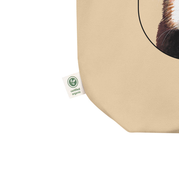 Product mockup of the organic cotton tote bag with cheeky red panda print.