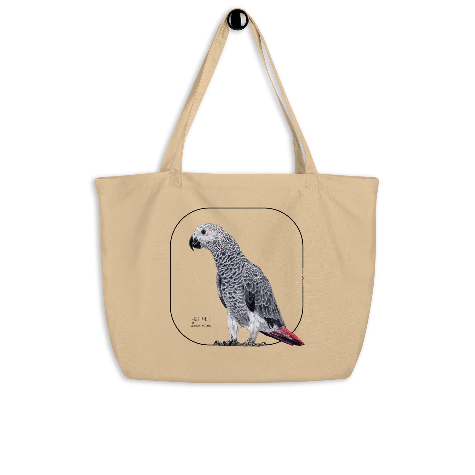 Mock up of our tote bag on a hanger. This sturdy bag comes with a beautiful print of a hand-drawn juvenile grey parrot. 100% organic cotton. Beach bag, shopping bag, travel bag, or just as a present. PETA-approved vegan.