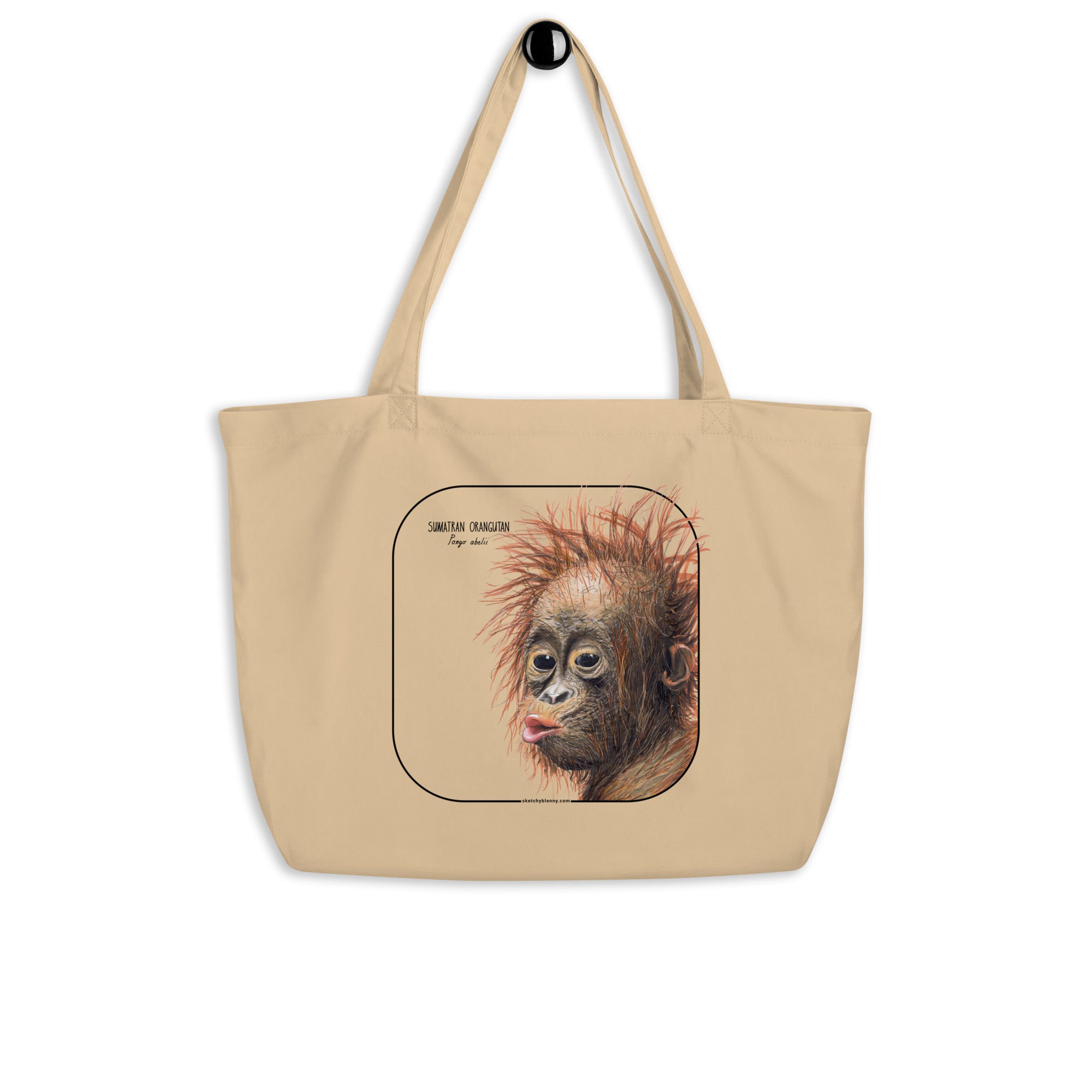Product mockup of the large sumatran orangutan organic tote bag, lying on a flat surface.
