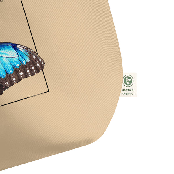 Certified organic label on a mock up of our blue morpho tote bag. Versatile, sturdy, this bag can be used as shopping bag, gym bag or as any everyday bag. Or present!
