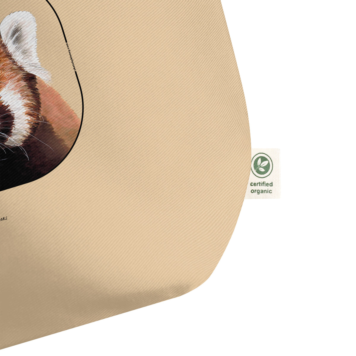 Product mockup of the large organic cotton tote bag with cheeky red panda print. here showing the organic label