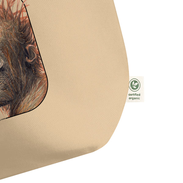 Product mockup of the large sumatran orangutan organic tote bag, lying on a flat surface.