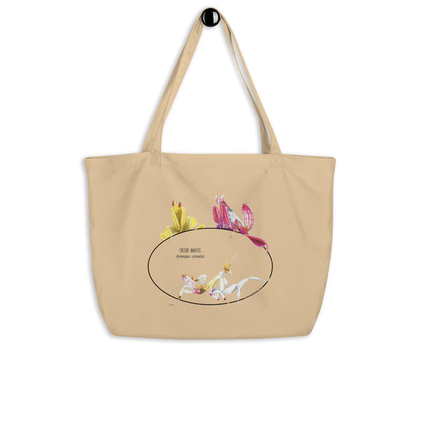 Mock-up of our large size Orchid mantis tote bag, hanging from a hanger. 100%organic cotton, sturdy and spacious