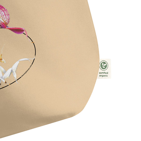 Mock-up of our large size Orchid mantis tote bag, showing the detail of the organic label tag.