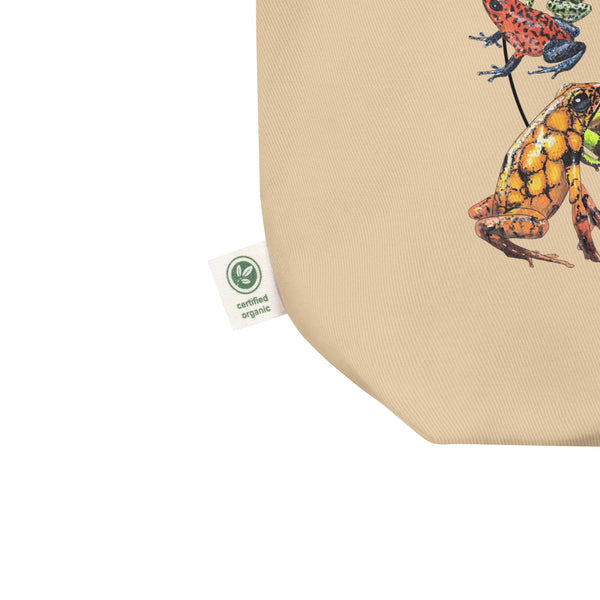 Product mockup of our poison dart frog tote bag with a selection of different oophaga-frogs.