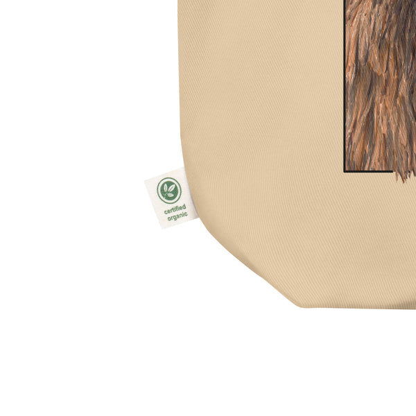 Product mockup of our 100% organic tot bag with a print of a europeant bison (wisent), detail of organic label.