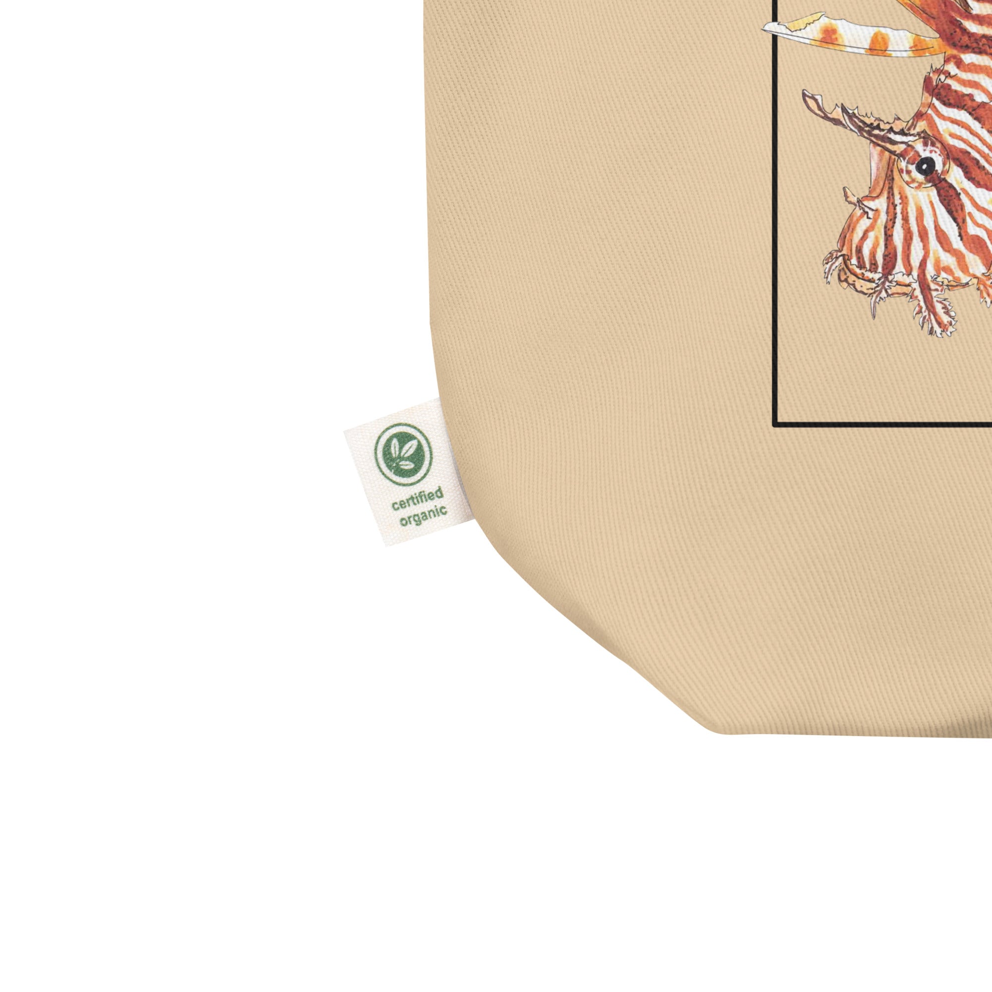 Close up mockup of our organic tote bag with a vibrantly striped red lionfish print. 