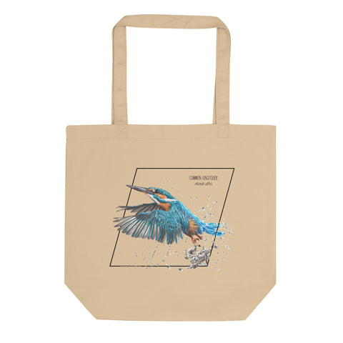 Product mockup of our Organic tote bag featuring a common kingfisher, lying flat on a white surface.