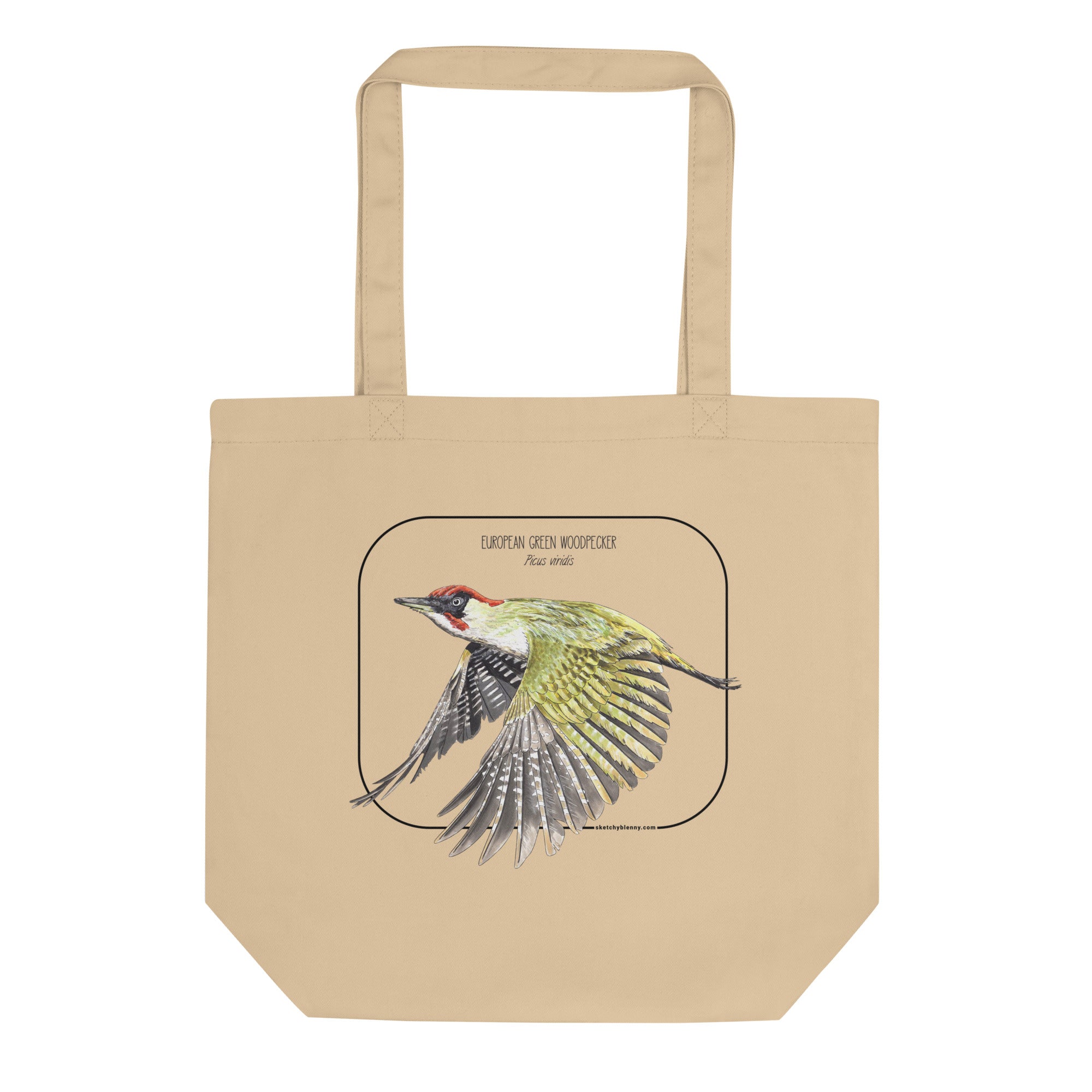 Product mockup of our 100% organic tote bag with a european green woodpecker print. Here lying flat on a white surface.