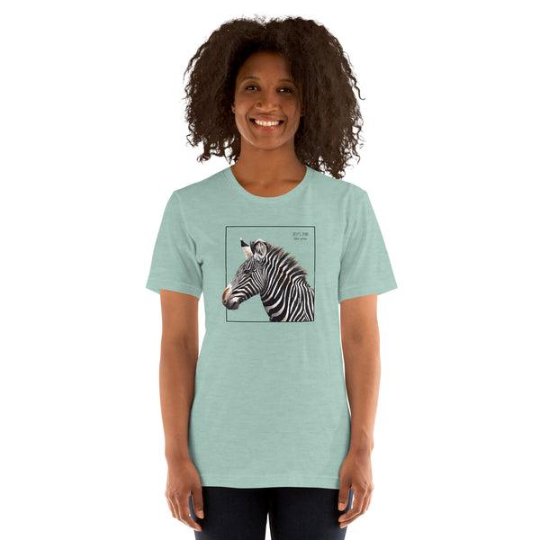 Product mockup of a female model wearing the very comfortable grévy's zebra t-shirt in the colour heather prism dusty blue.