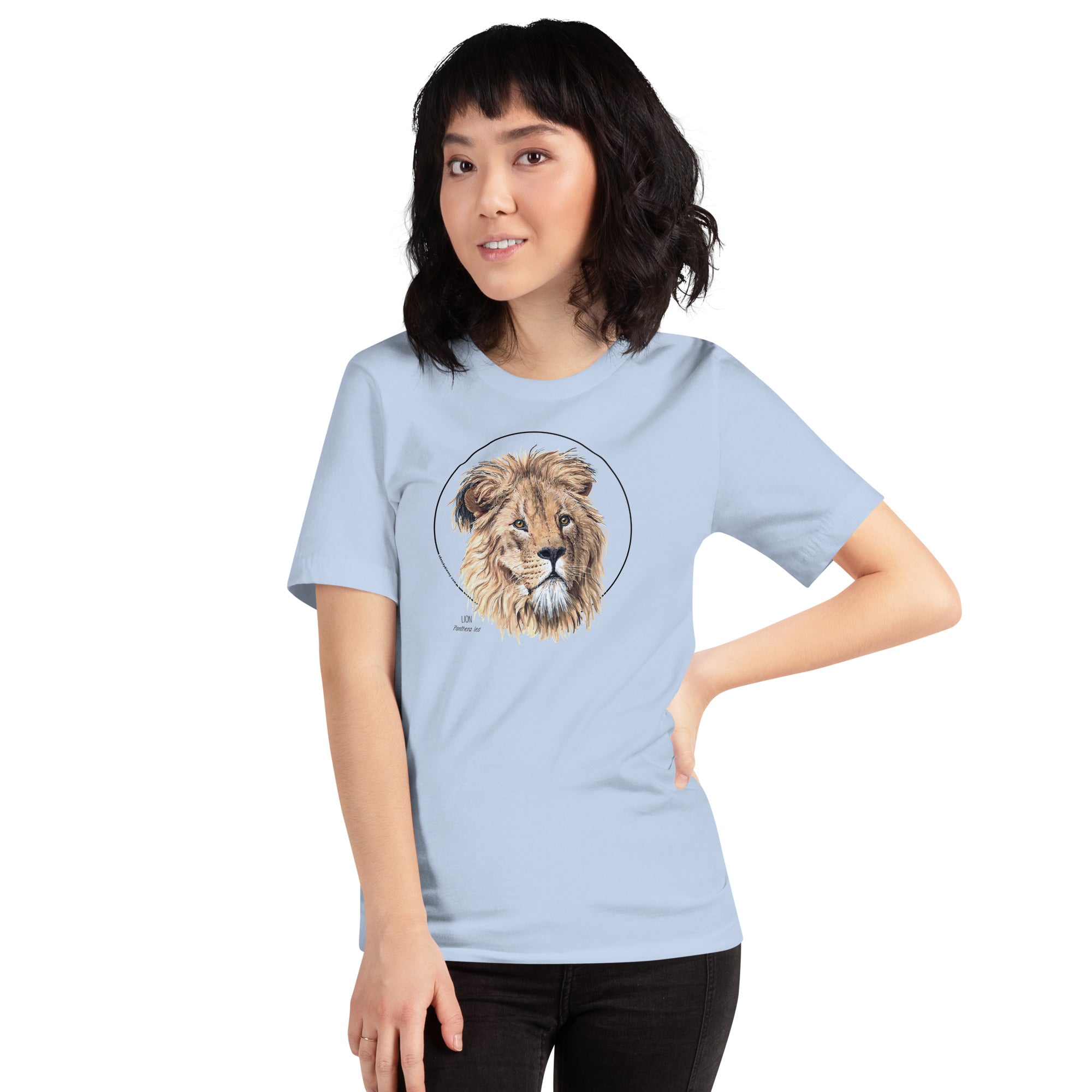 Product mockup of our lion print t-shirt, worn by a female model. This shirt's base colour is baby blue.