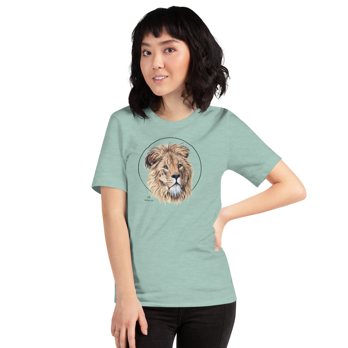 Product mockup of our lion print t-shirt, worn by a female model. This shirt's base colour is heather prism dusty blue.