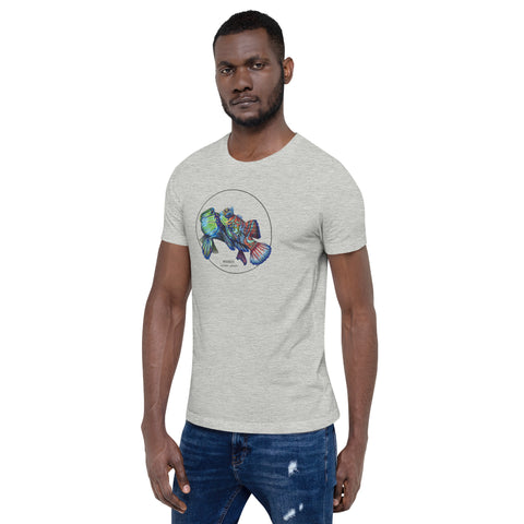 Product mockup showing a male model wearing the t-shirt with a colourful print of two mandarinfish in courtship. Base colour of the shirt is athletic heather.