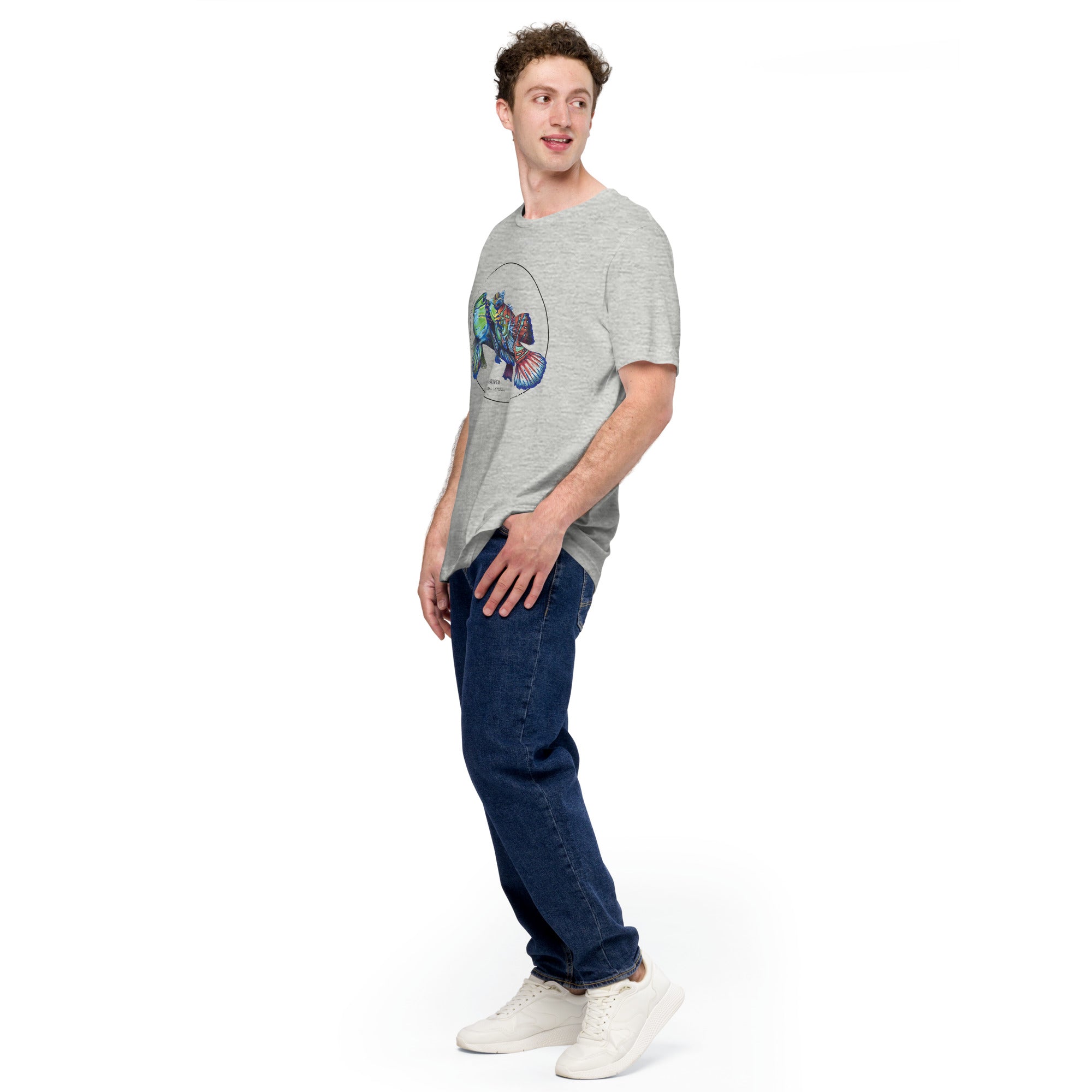 Product mockup showing a male model wearing the t-shirt with a colourful print of two mandarinfish in courtship. Base colour of the shirt is athletic heather.