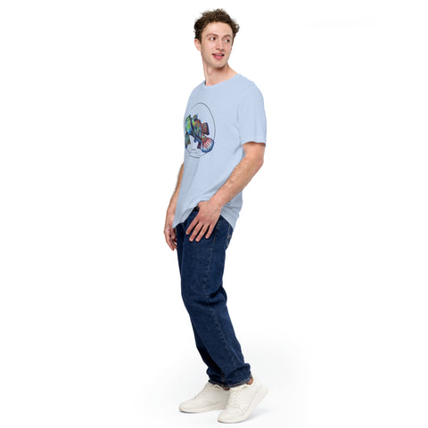 Product mockup showing a male model wearing the t-shirt with a colourful print of two mandarinfish in courtship. Base colour of the shirt is baby blue.