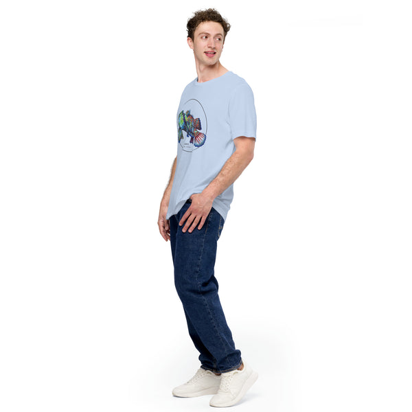 Product mockup showing a male model wearing the t-shirt with a colourful print of two mandarinfish in courtship. Base colour of the shirt is baby blue.