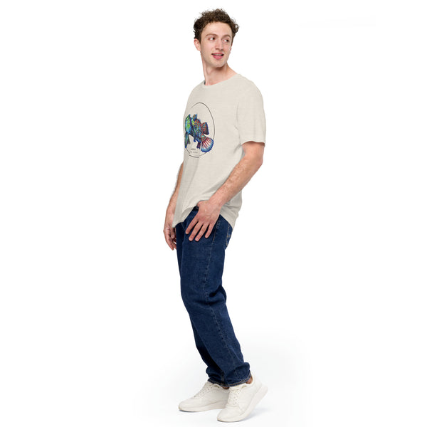Product mockup showing a male model wearing the t-shirt with a colourful print of two mandarinfish in courtship. Base colour of the shirt is heather dust.