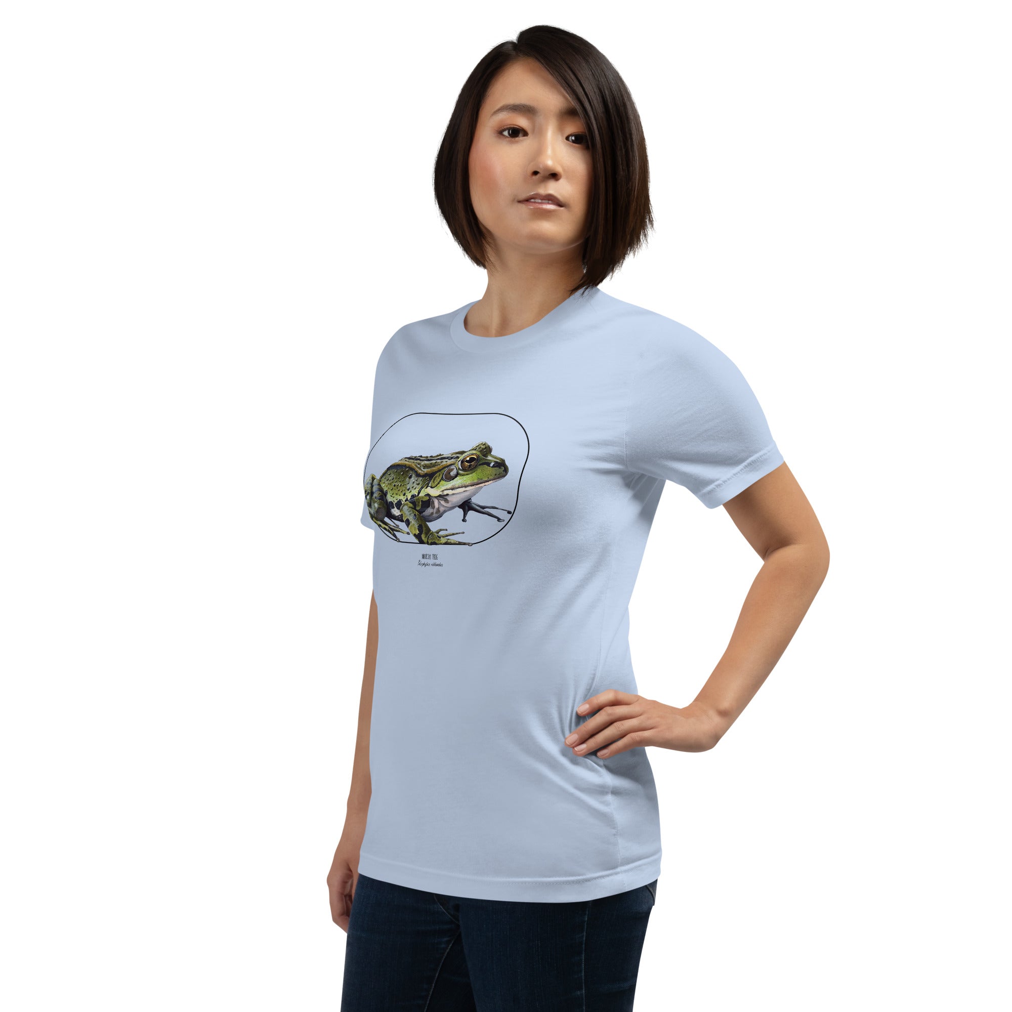 Product mockup of our beautiful marsh frog t-shirt on a slim female model. The shirt base colour is baby blue.