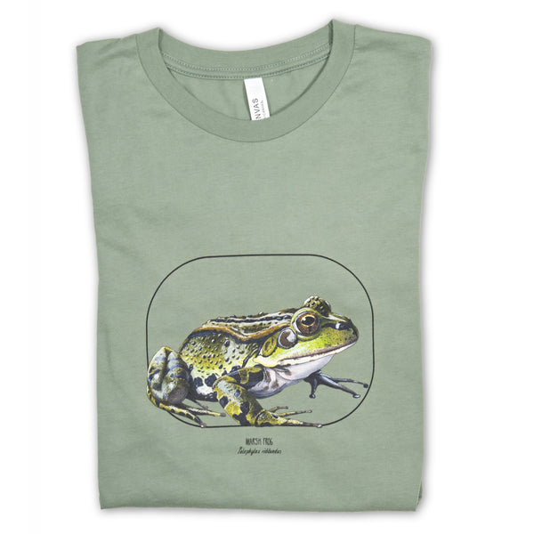 Lying folded on a white surface, this photo showcases our sage coloured t-shirt with a marsh frog print.