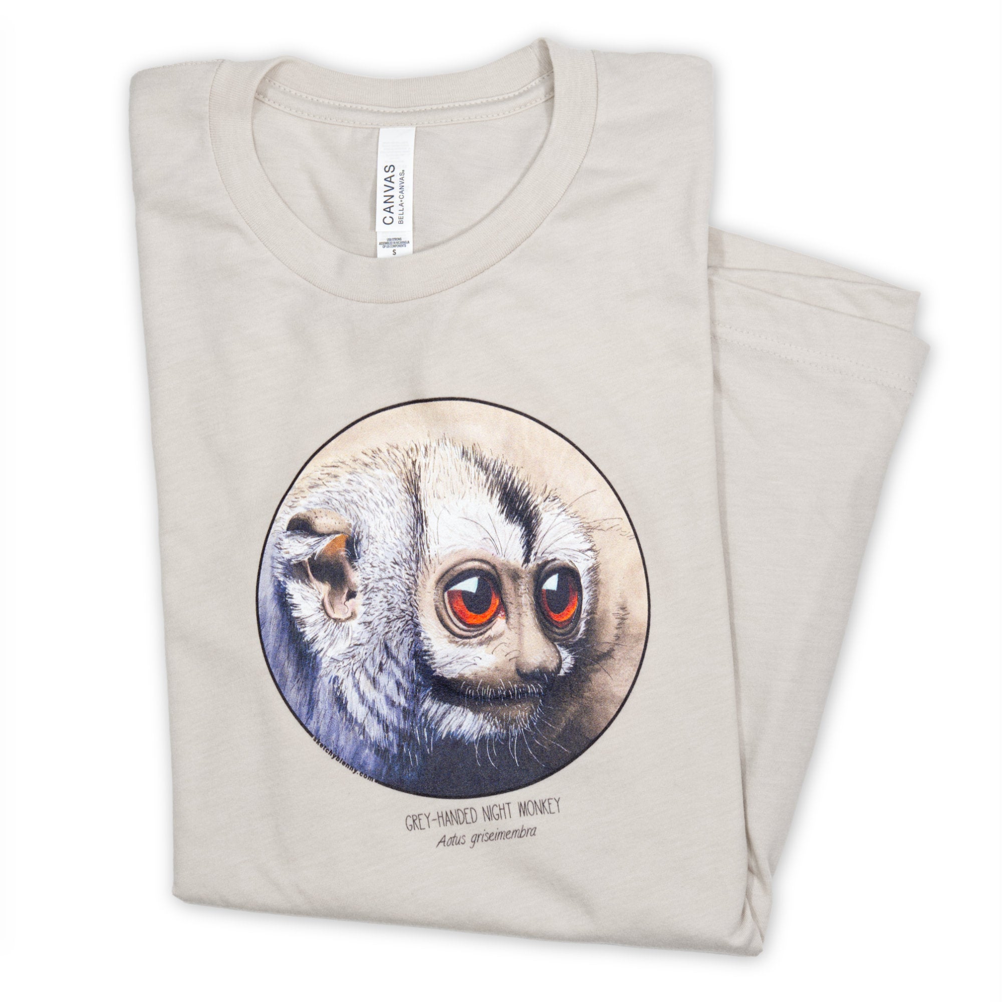 Product photo of our cheeky night monkey t-shirt folded on a white surface. Heather dust base colour.