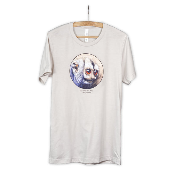 Product photo of our cheeky night monkey t-shirt on a wooden hanger. Heather dust base colour.