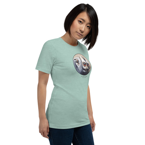 Product mockup of our cheeky night monkey t-shirt on a female model. Heather prism dusty blue base colour.