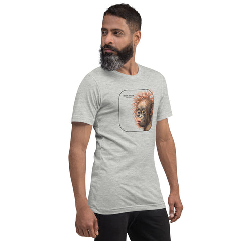 Product mockup showing a male model wearing a t-shirt with a cheeky young sumatran orangutan print. The shirt base colour is athletic heather.