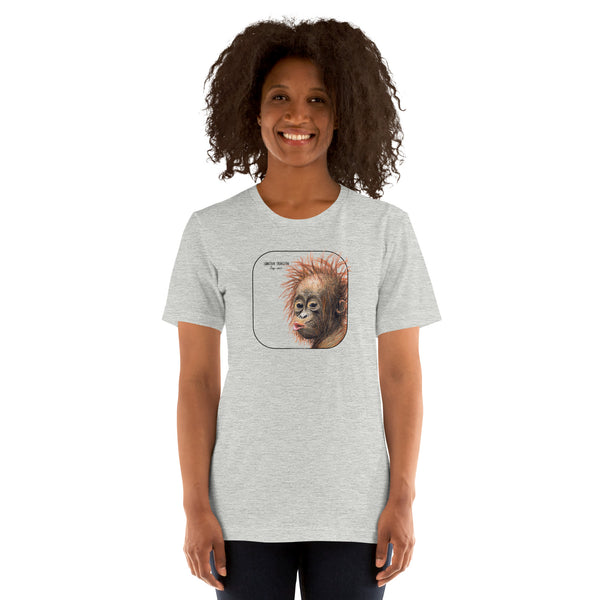 Product mockup showing a female model wearing a t-shirt with a cheeky young sumatran orangutan print. The shirt base colour is athletic heather.