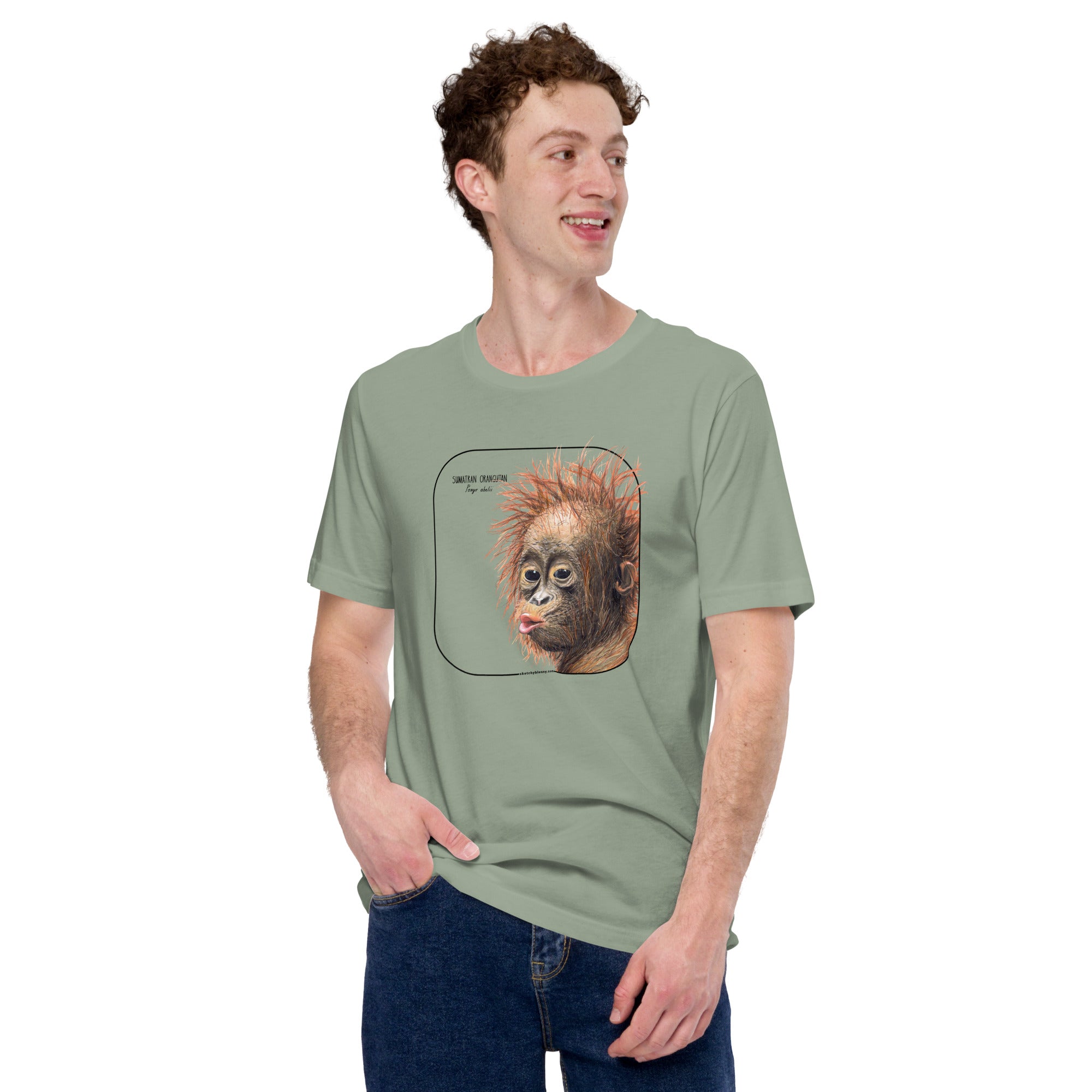 Product mockup showing a male model wearing a t-shirt with a cheeky young sumatran orangutan print. The shirt base colour is sage.