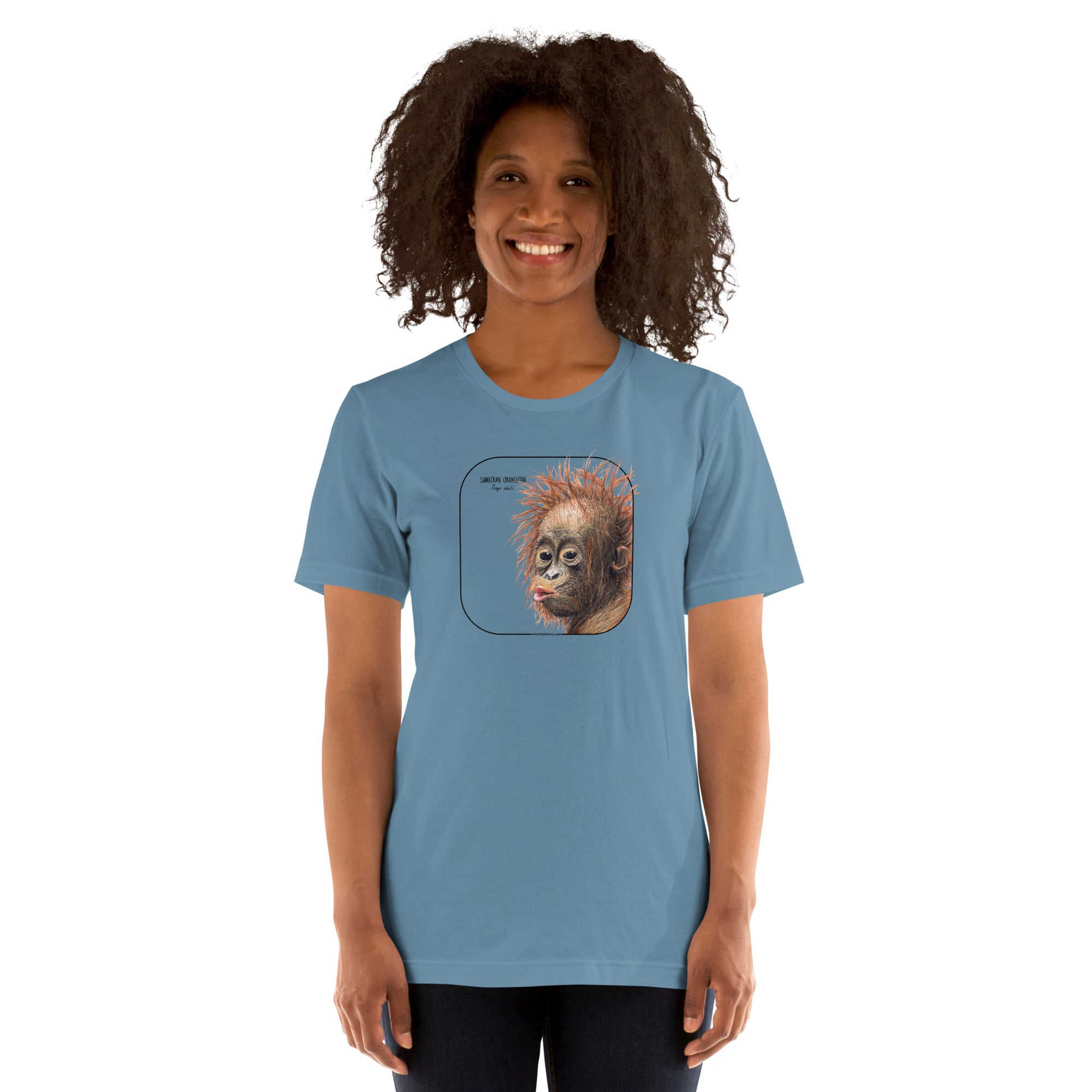 Product mockup showing a female model wearing a t-shirt with a cheeky young sumatran orangutan print. The shirt base colour is steel blue.