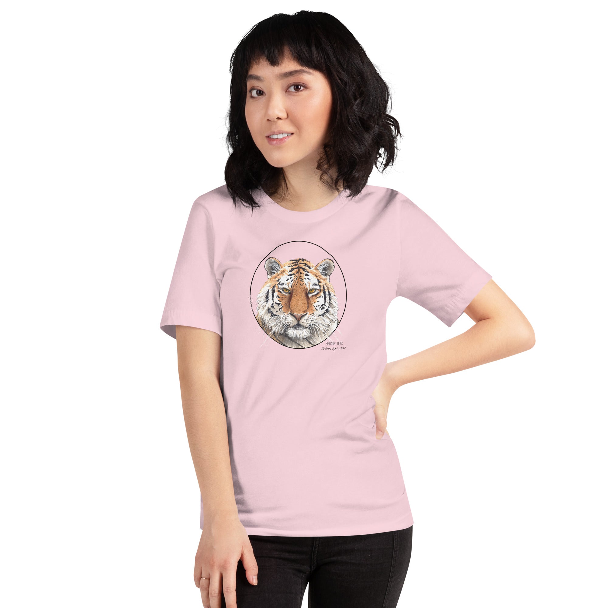 Product mockup of a female model wearing the stunning siberian tiger t-shirt in soft pink colour.