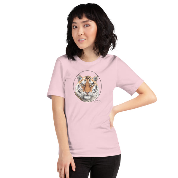 Product mockup of a female model wearing the stunning siberian tiger t-shirt in soft pink colour.