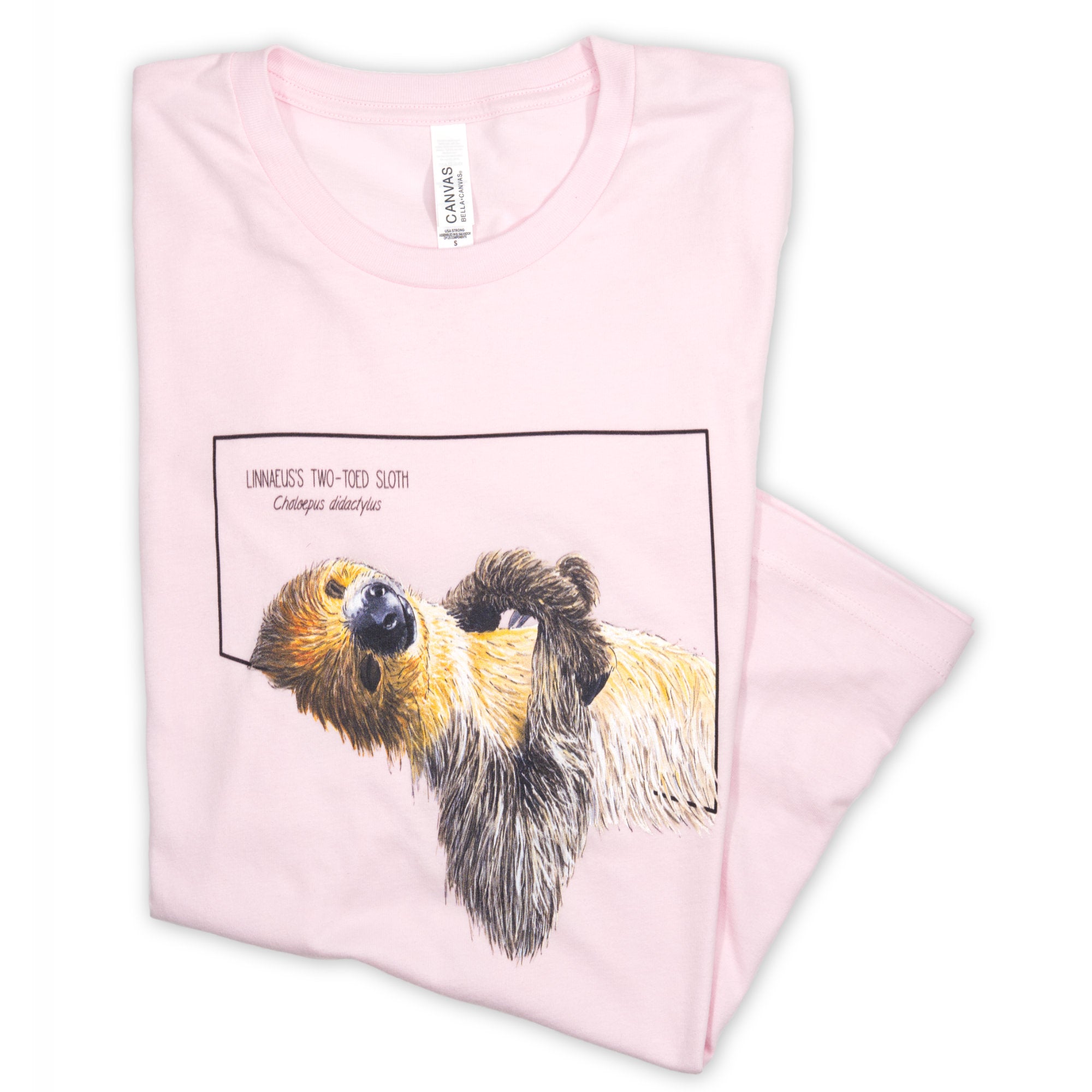 Photo showing our soft pink t-shirt with a charming two-toed sloth print folded on a white surface.
