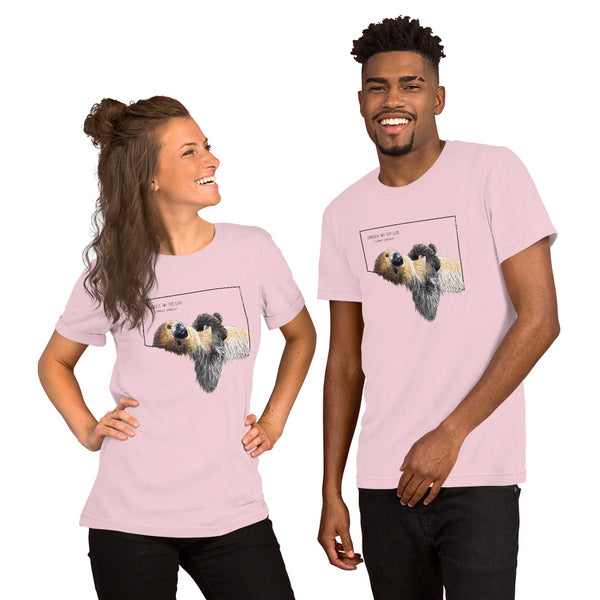 Product mockup with a male and a female model wearing the soft pink coloured shirt.