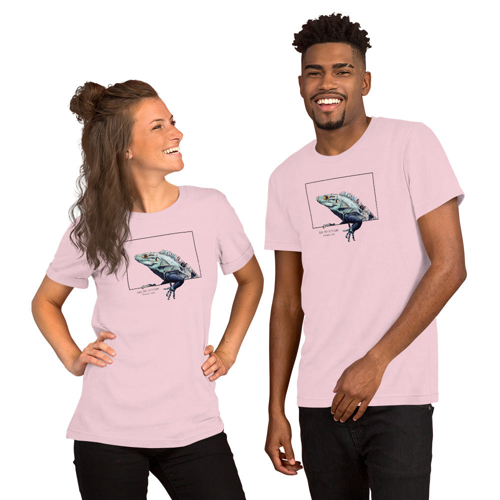 Product mockup of our black iguana t-shirt on a soft pink base colour. Worn by a male and a female model.