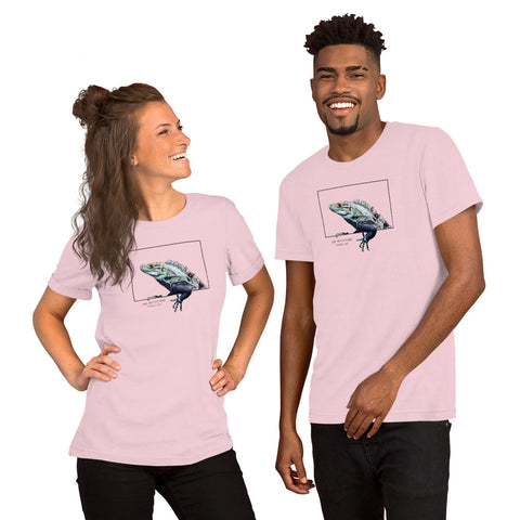 Product mockup of our black iguana t-shirt on a soft pink base colour. Worn by a male and a female model.